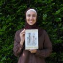 jumaana with book